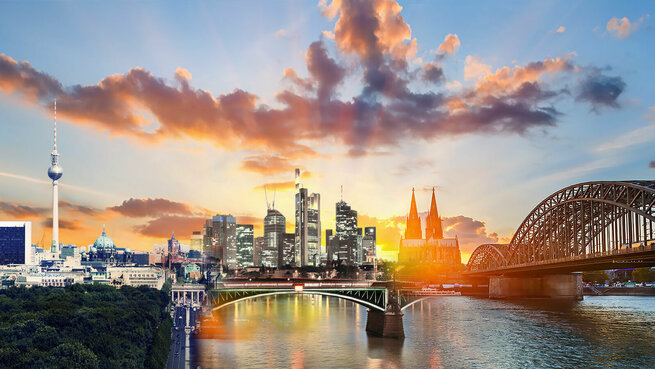 Skylines von Berlin, Frankfurt und Köln Skylines von Berlin, Frankfurt und Köln in einem Bild vor einem Sonnenuntergang.
